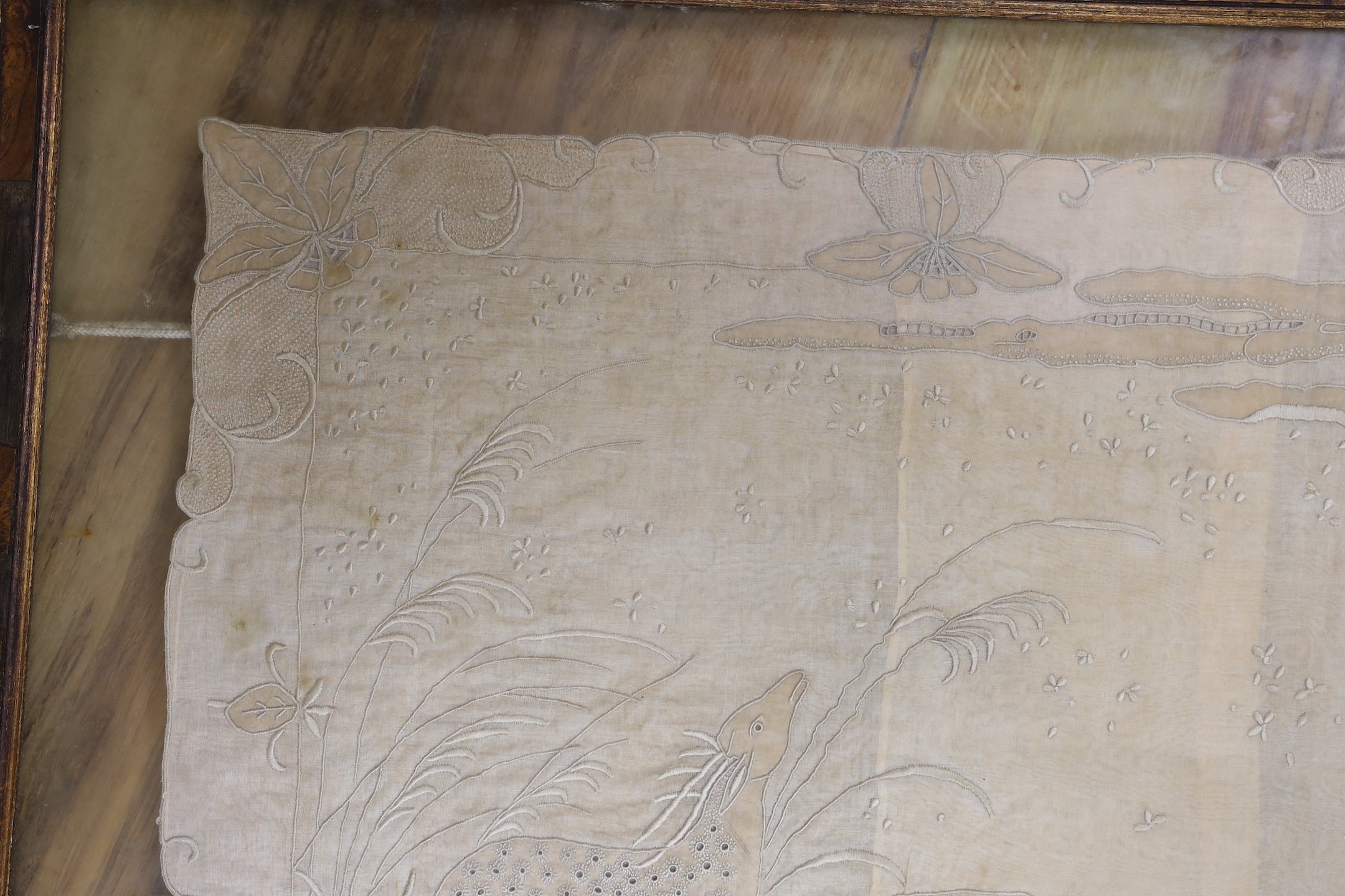 A framed embroidered silk panel, 48 cms wide x 38 cms high